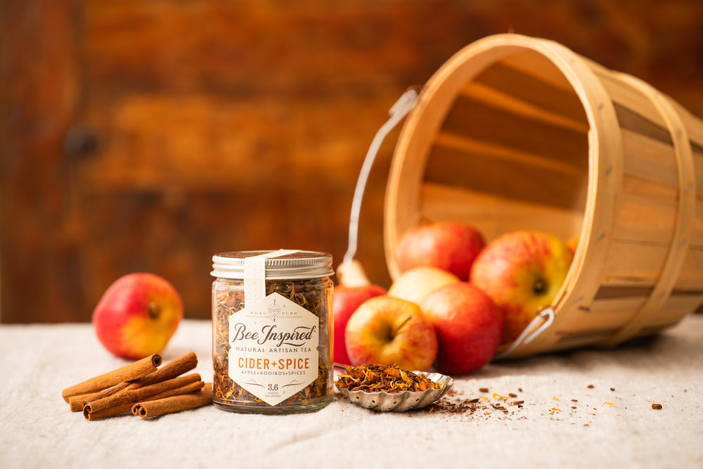 Cider and Spice Tea with cinnamon sticks and apples 