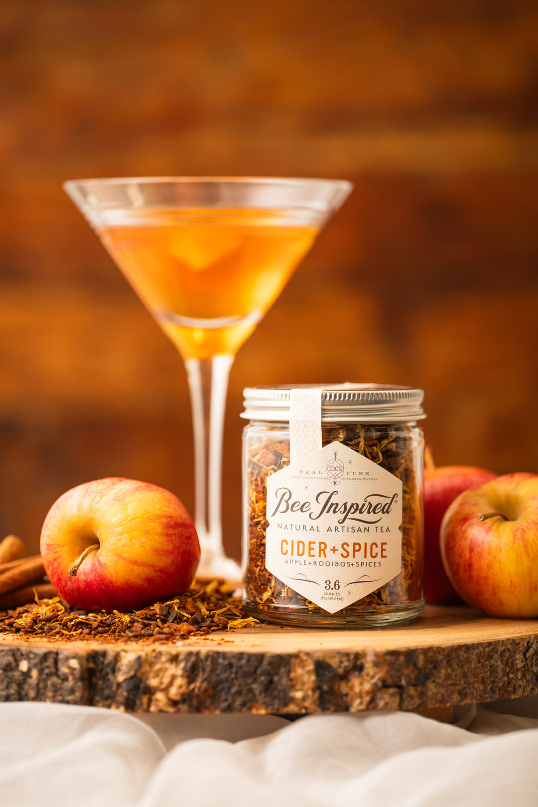 Cider and Spice Tea with apples and a martini glass 