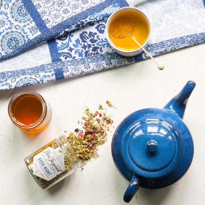 good night tea open with blue tea pot and honey