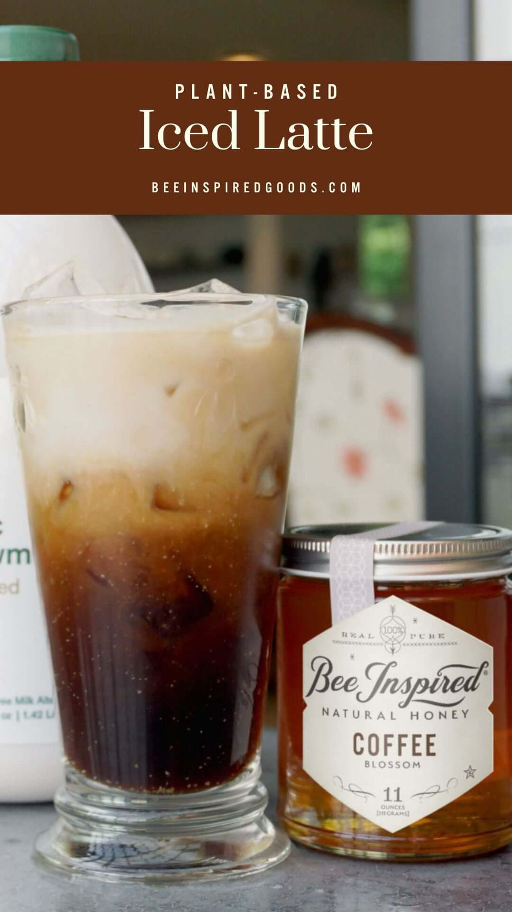 "Plant-Based Iced Latte beeinspiredgoods.com" an iced latte in a glass next to a jar of Bee Inspired coffee honey from bee inspired honey retail store in owings mills