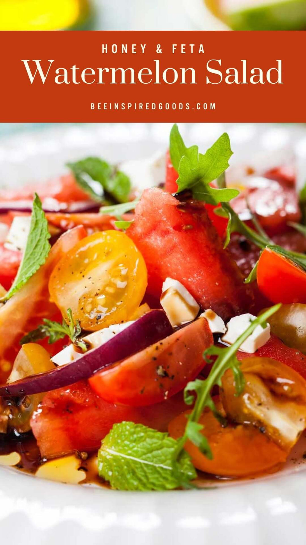 "Honey & Feta Watermelon Salad beeinspiredgoods.com" a close up image of a salad