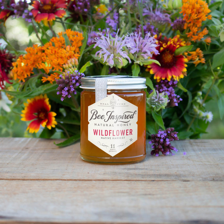 Wildflower honey with bouquet of wildflowers 