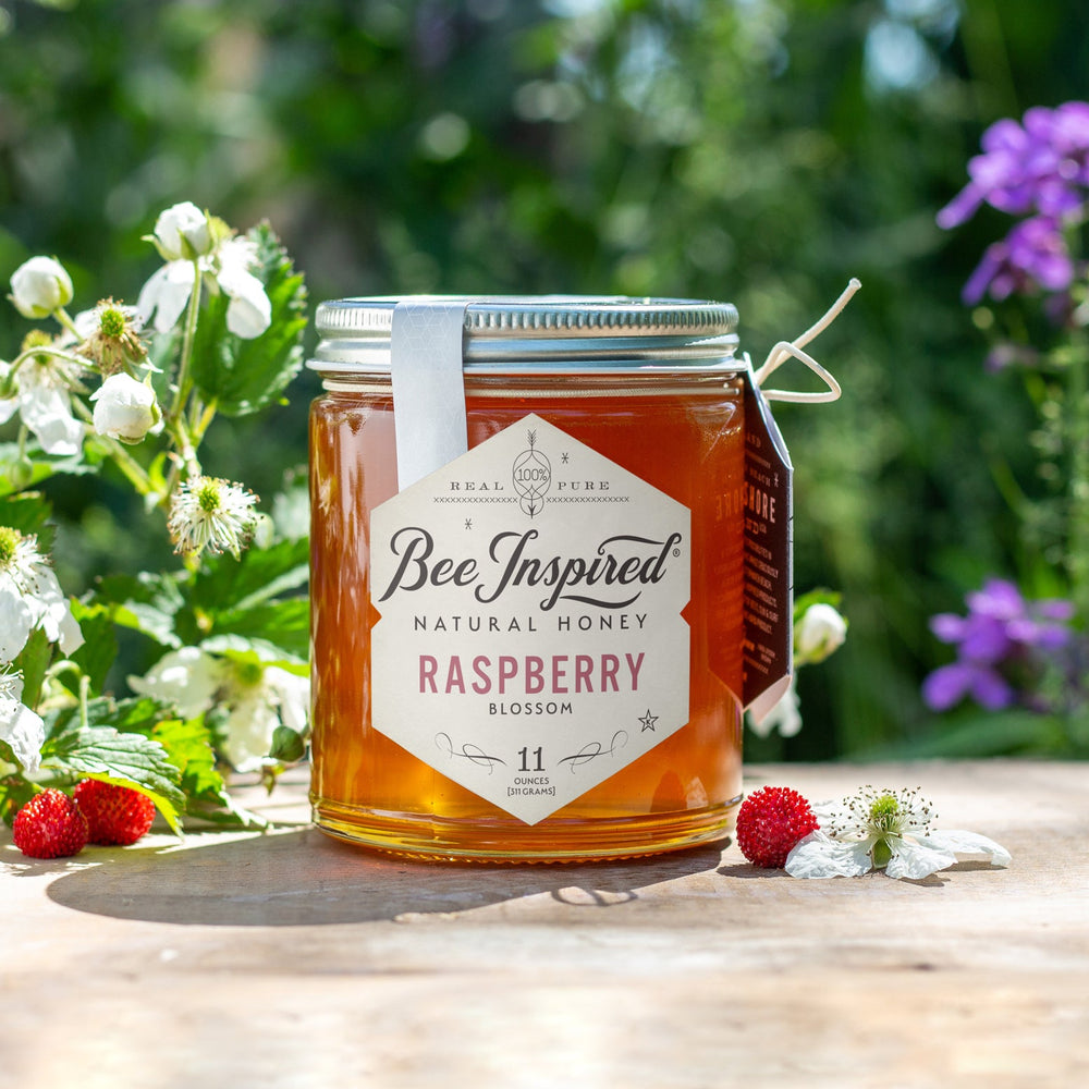 raspberry honey with raspberry bush