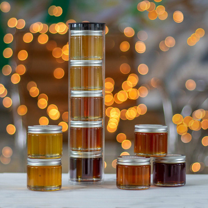 honey tasting tower with holiday lights