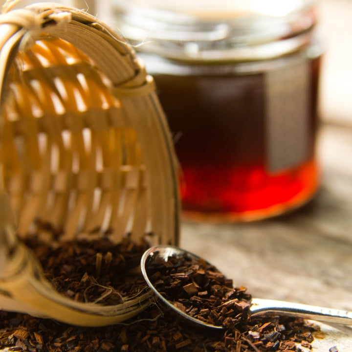 Bee's Knees Tea with wood strainer